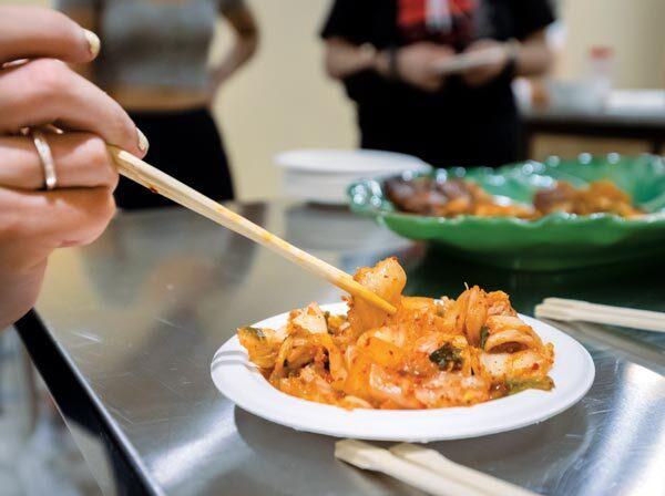 chopsticks pick up Korean dish
