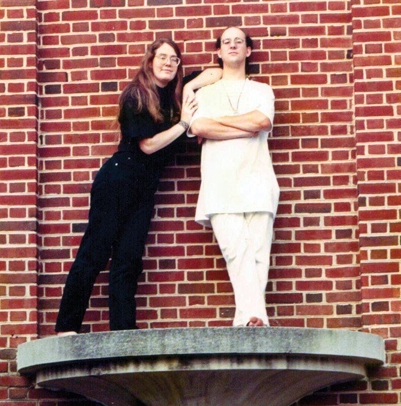 Kristin and Andy Looney pose on a ledge