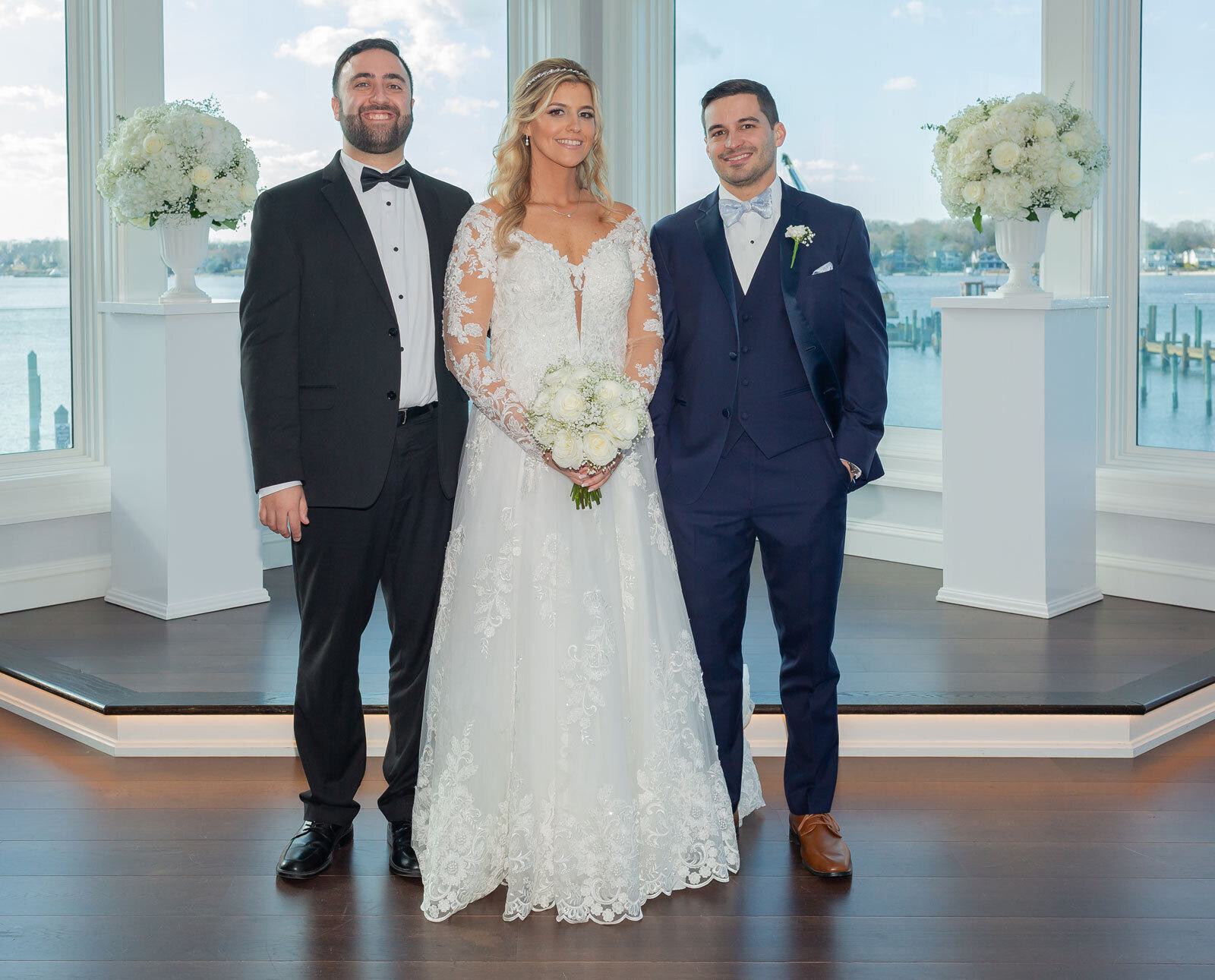 Nima Farshchi with Tommy and Adele Treacy on their wedding day