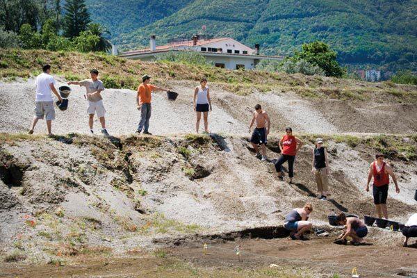 students excavating