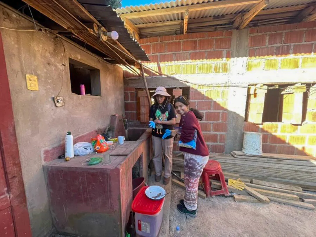 students collect water samples