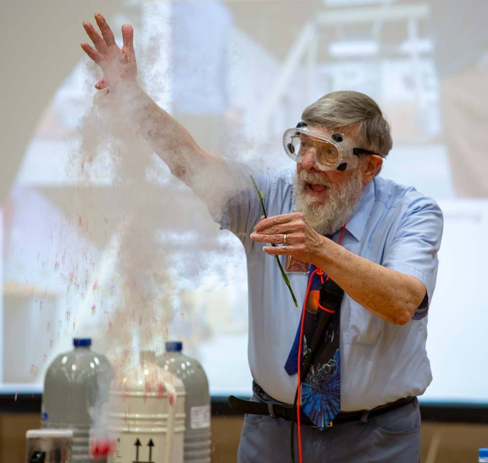 professor demonstrates the properties of liquid nitrogen
