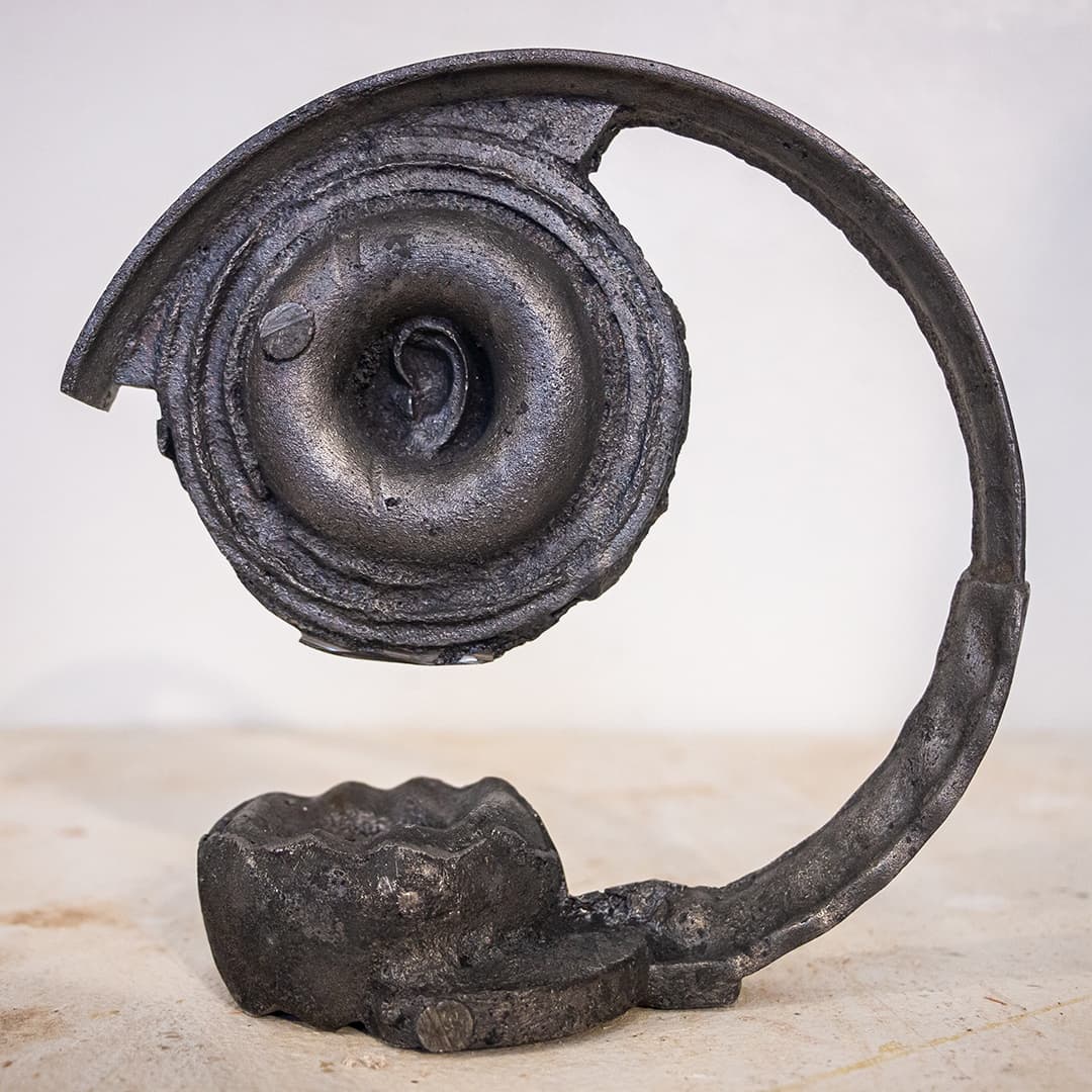 iron sculpture inspired by headphones