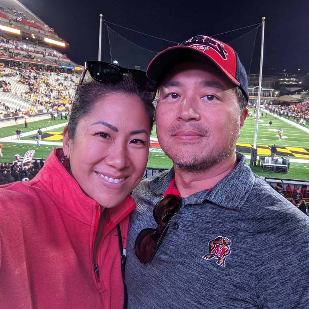 Betty Wang ’96 and Hsuan Ou ’97 at a Terps football game