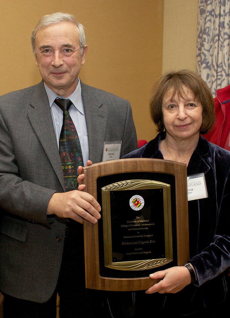 Michael and Eugenia Brin hold plaque