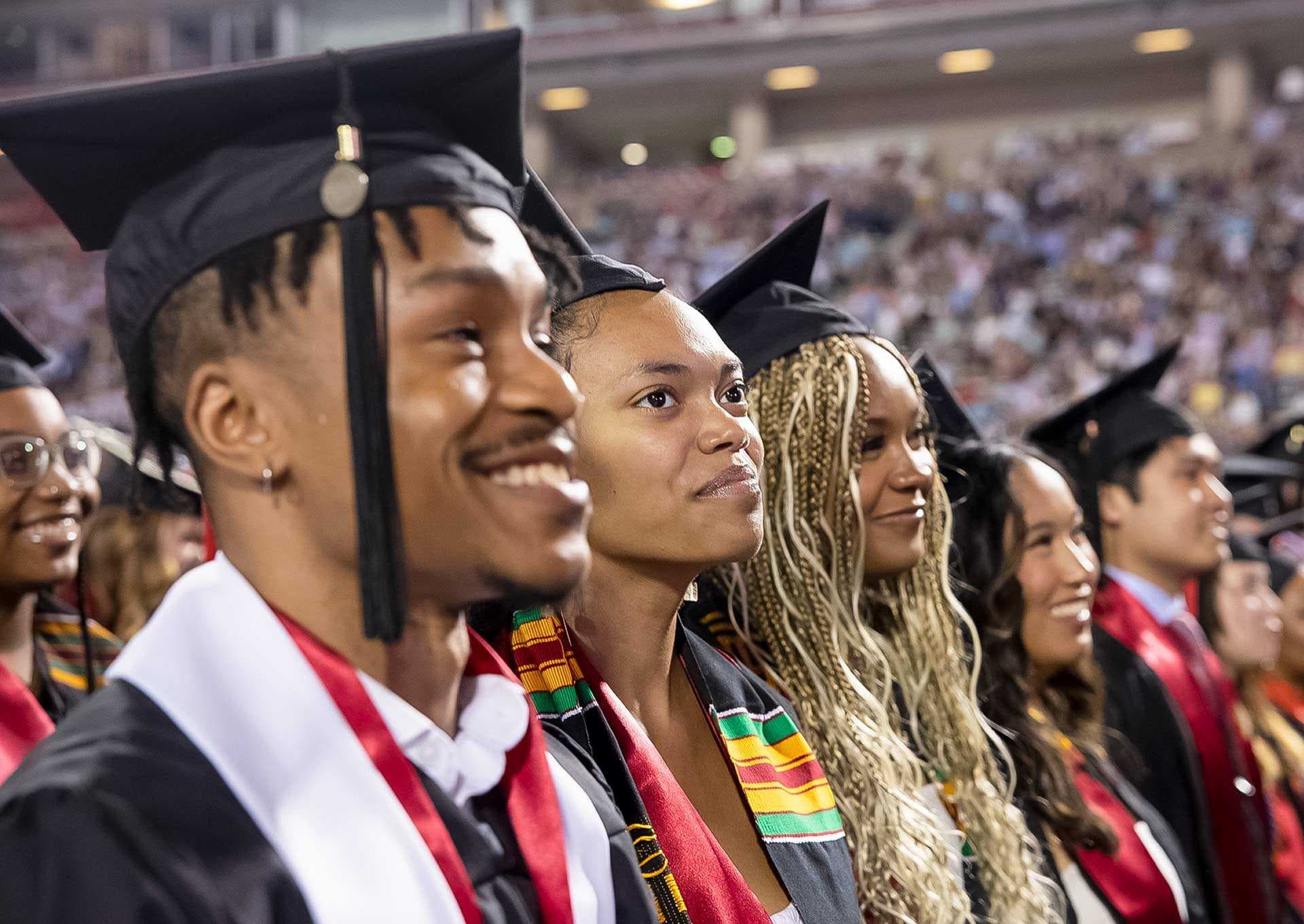 students smile at Commencement
