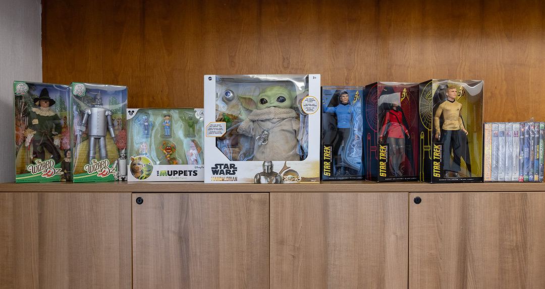 Wizard of Oz, Muppets, Baby Yoda and Star Trek character toys in boxes