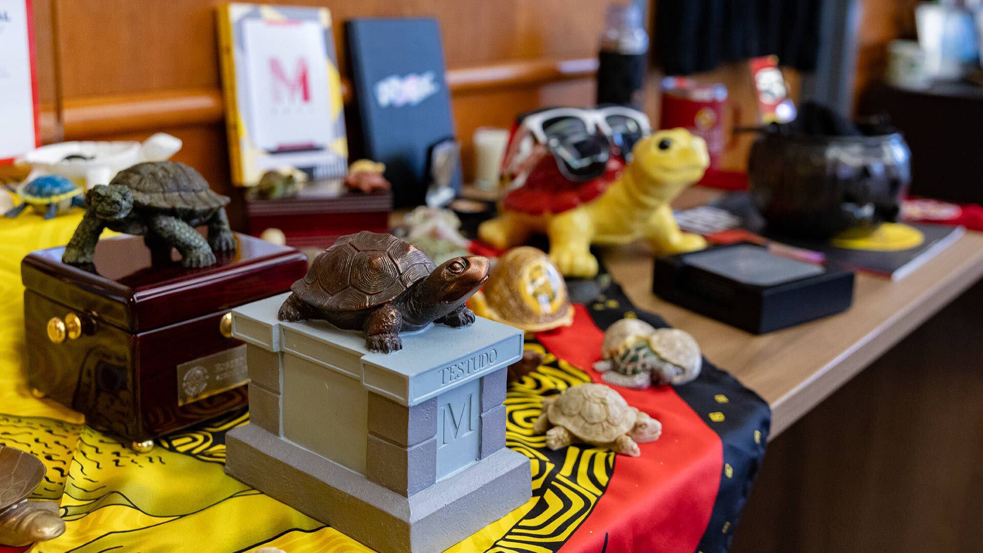 3D printed Testudo and other turtle figurines on a table