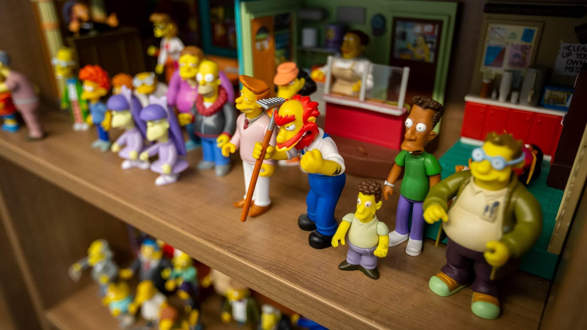 shelves of Simpsons figurines