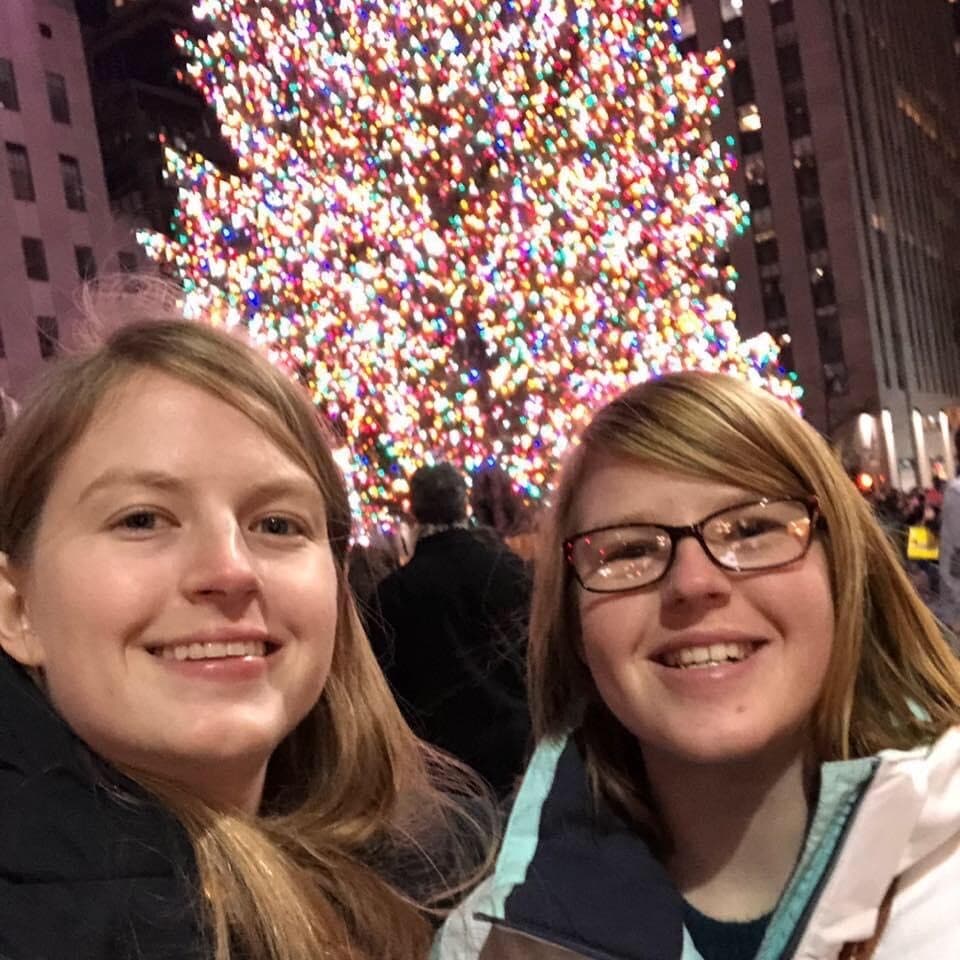 Kristin and Ciara Donegan with Christmas lights in background