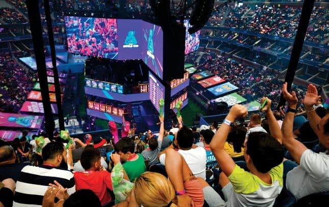 Esports fans cheer during the finals of the 2019 Fortnite World Cup held at New York City’s Arthur Ashe Stadium.