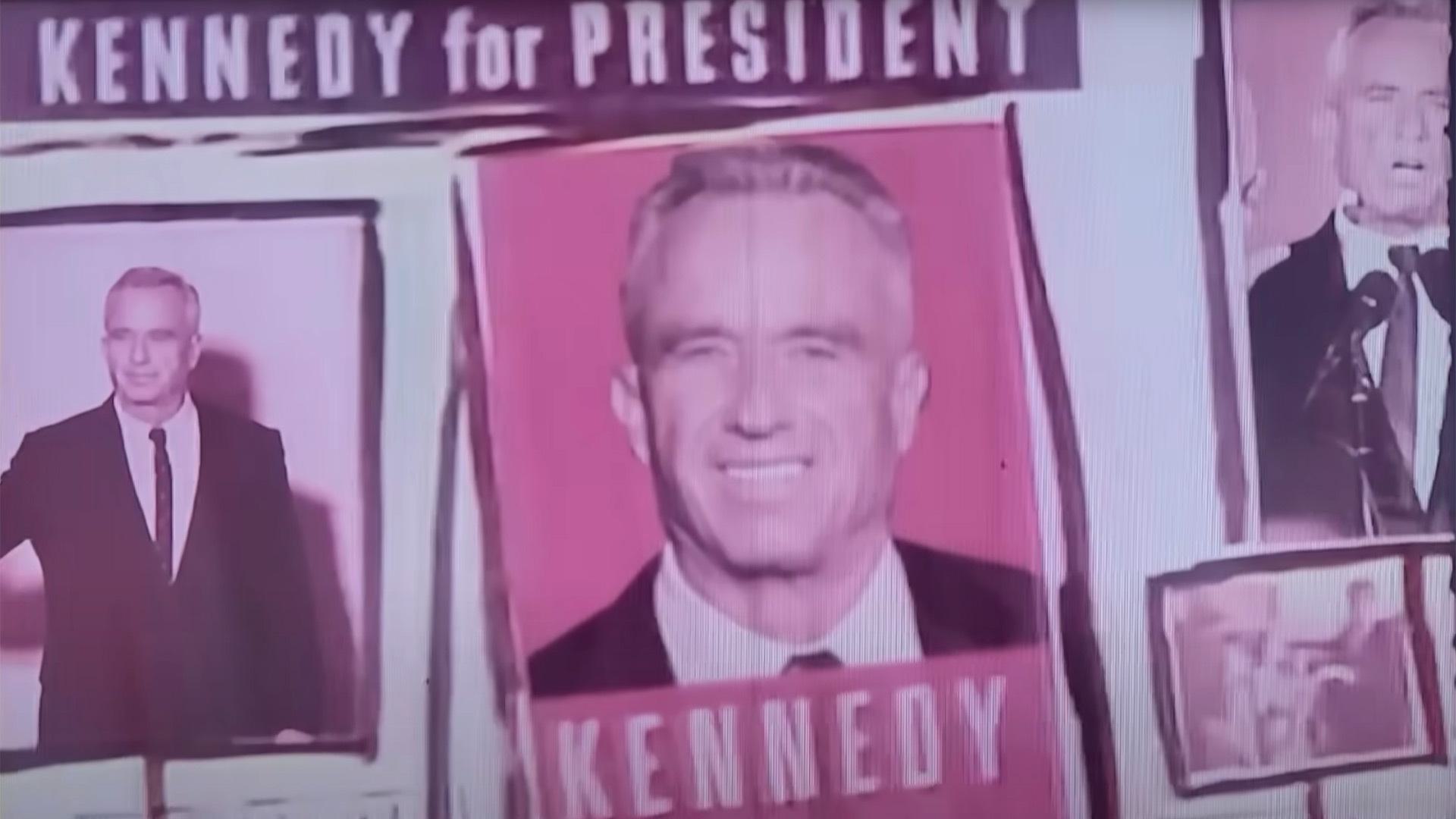Robert F. Kennedy Jr. with signs that say Kennedy for President