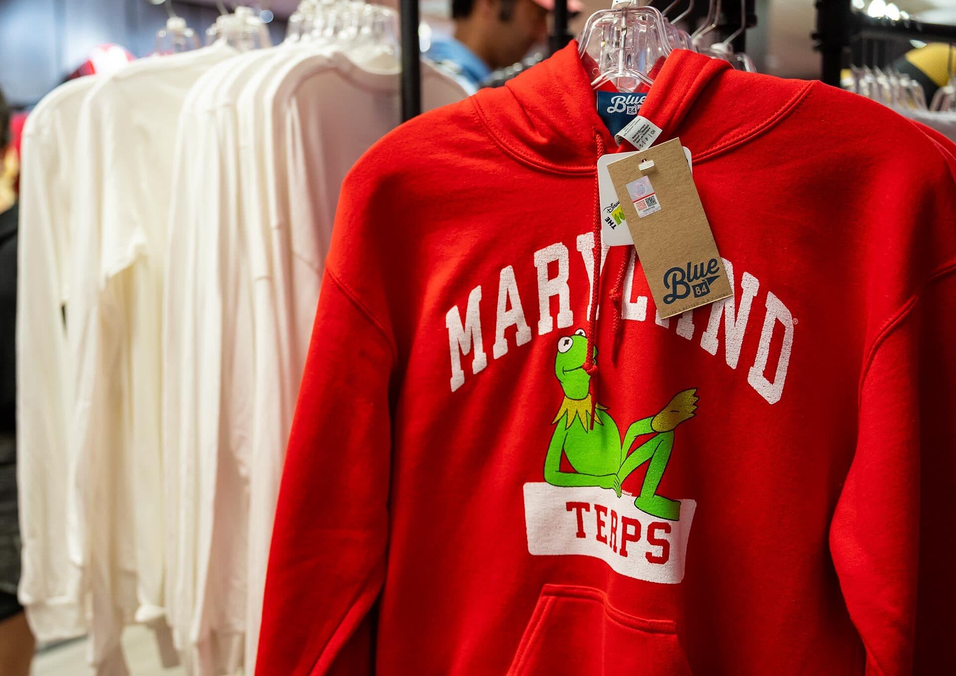 A red Maryland hoodie with a green Kermit