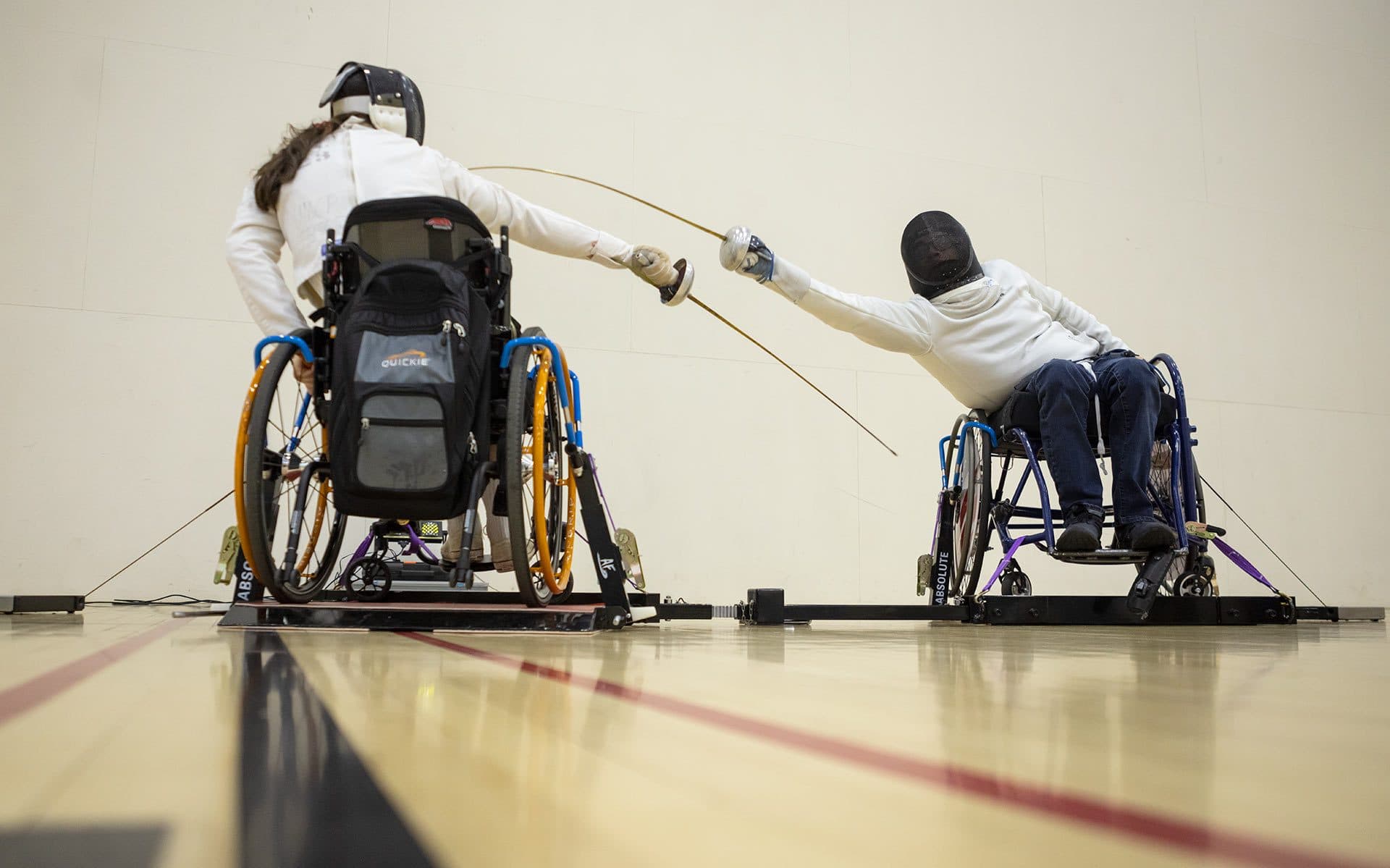 fencers compete in wheelchairs