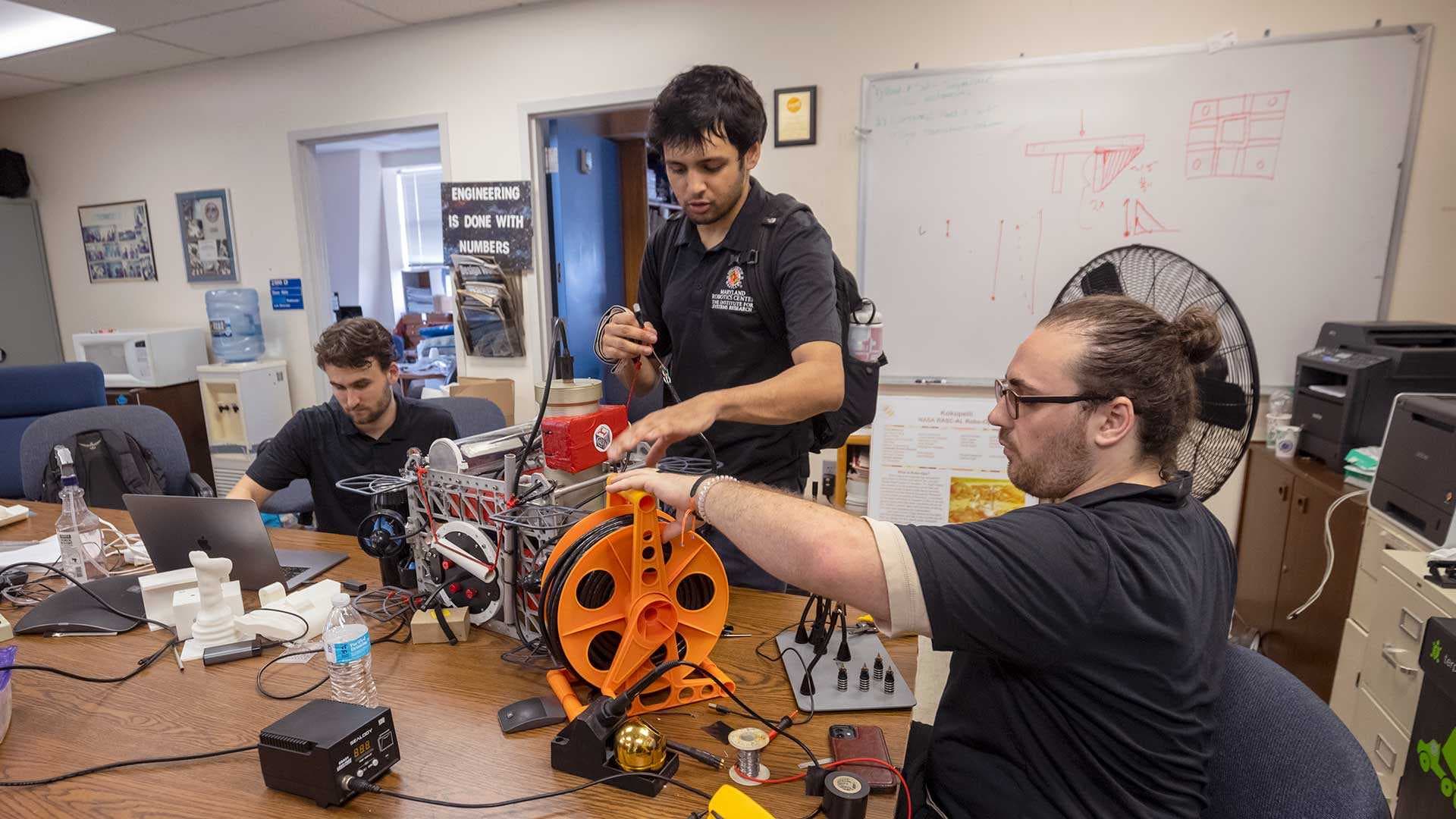 Students work on a robot